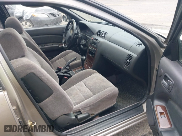 1999 Nissan Maxima GXE z VIN JN1CA21D5XT203484, wystawiony jako IAAI lot #42161696 z przebiegiem 249 747 mil mil oraz . Historia ofert i sprzedaży dostępna na DreamBid. Obrazek 5.