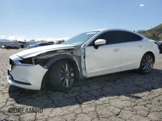 2021 Mazda 6 Touring with VIN JM1GL1VM0M1612027, listed as a Copart auction lot 48262185 with 67,568 mi miles and Salvage Title. Bid and sale history available at DreamBid. Image 1.