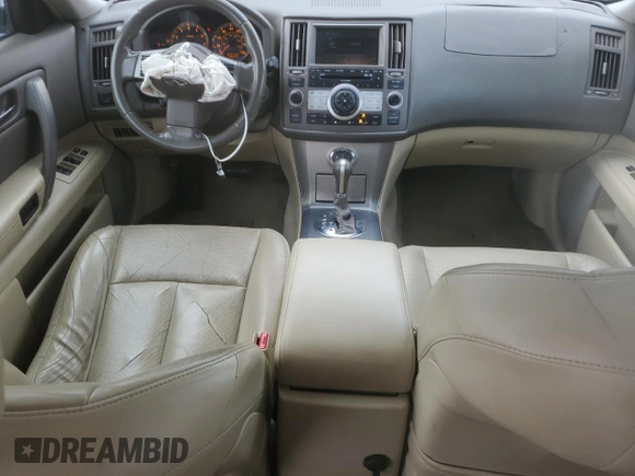 2008 Infiniti FX z VIN JNRAS08W88X203941, wystawiony jako Copart lot #54066825 z przebiegiem 223 729 mil mil oraz Szkoda całkowita • Salvage title. Historia ofert i sprzedaży dostępna na DreamBid. Obrazek 8.