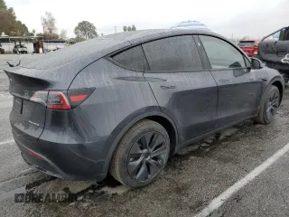 2025 Tesla Model Y Long Range with VIN 7SAYGAEE3SF216635, listed as a Copart auction lot 44614555 with 400 mi miles and Salvage Title. Bid and sale history available at DreamBid. Image 3.