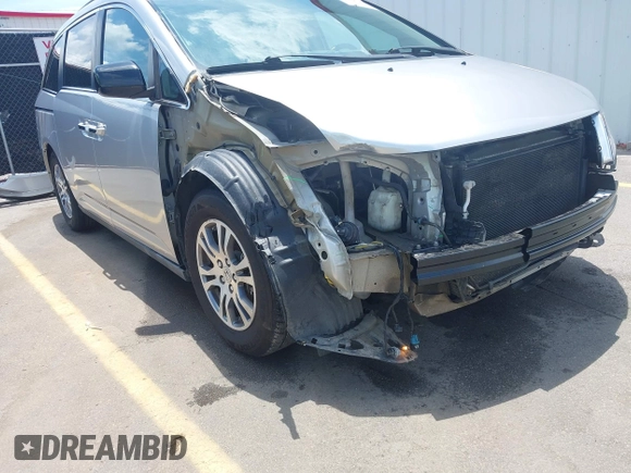 2012 Honda Odyssey EX-L with VIN 5FNRL5H65CB076534, listed as a IAAI auction lot 42440258 with 150,866 mi miles and . Bid and sale history available at DreamBid. Image 6.