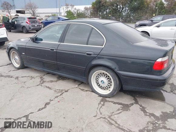 2001 BMW 5 Series 525iA with VIN WBADT43451GX20026, listed as a IAAI auction lot 41490075 with 141,700 mi miles. Bid and sale history available at carsss.com. Image 3.