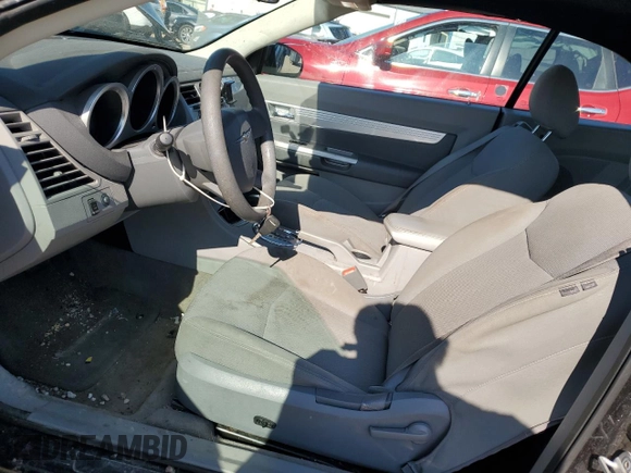 2008 Chrysler Sebring Touring z VIN 1C3LC55R38N176522, wystawiony jako Copart lot #57062395 z przebiegiem 151 843 mil mil oraz Szkoda całkowita • Salvage title. Historia ofert i sprzedaży dostępna na DreamBid. Obrazek 7.