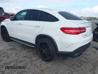 2018 Mercedes-Benz GLE 63 S AMG with VIN 4JGED7FB3JA099383, listed as a IAAI auction lot 41215972 with 44,057 mi miles and . Bid and sale history available at DreamBid. Image 3.