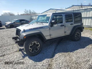 2015 Jeep Wrangler Unlimited Rubicon Hard Rock with VIN 1C4HJWFG2FL686556, listed as a Copart auction lot 54049955 with 126,675 mi miles and Salvage title. Bid and sale history available at DreamBid. Image 1.
