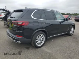 2020 BMW X5 xDrive40i with VIN 5UXCR6C09L9C95232, listed as a Copart auction lot 60697765 with 30,017 mi miles and Salvage title. Bid and sale history available at DreamBid. Image 3.