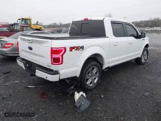2018 Ford F-150 XL with VIN 1FTEW1EG3JFE60221, listed as a IAAI auction lot 41463317 with 99,111 mi miles. Bid and sale history available at carsss.com. Image 4.
