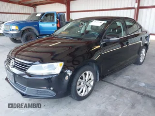 2013 Volkswagen Jetta SE with VIN 3VWDP7AJ5DM423587, listed as a IAAI auction lot 42609789 with 220,922 mi miles and . Bid and sale history available at DreamBid. Image 2.