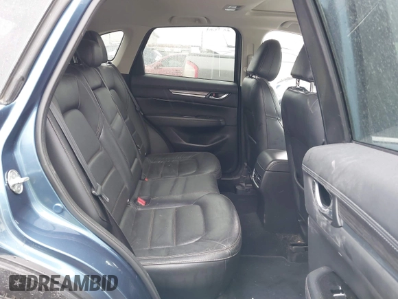 2017 Mazda CX-5 Grand Touring with VIN JM3KFADL9H0187338, listed as a IAAI auction lot 41382034 with 141,972 mi miles and . Bid and sale history available at carsss.com. Image 8.