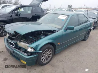 1998 BMW 3 Series 318iA with VIN WBACC0320WEK26338, listed as a IAAI auction lot 41187823 with 145,250 mi miles. Bid and sale history available at carsss.com. Image 2.