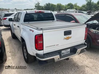 2020 Chevrolet Colorado 4WD Work Truck z VIN 1GCGTBEN8L1146859, wystawiony jako IAAI lot #42561237 z przebiegiem 96 384 mil mil oraz . Historia ofert i sprzedaży dostępna na DreamBid. Obrazek 10.