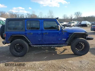 2020 Jeep Wrangler Unlimited Sport S z VIN 1C4HJXDN0LW347487, wystawiony jako IAAI lot #41449066 z przebiegiem 44 007 mil mil oraz . Historia ofert i sprzedaży dostępna na DreamBid. Obrazek 13.