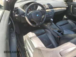 2009 BMW 1 Series 135i with VIN WBAUN93599VK40210, listed as a Copart auction lot 54166905 with 148,899 mi miles and Salvage title. Bid and sale history available at DreamBid. Image 8.