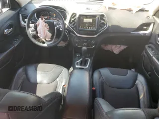 2015 Jeep Cherokee Trailhawk with VIN 1C4PJMBS0FW705288, listed as a Copart auction lot 61796275 with 133,874 mi miles and Salvage title. Bid and sale history available at DreamBid. Image 8.