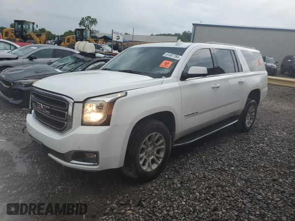 2020 GMC Yukon XL SLT with VIN 1GKS1GKC7LR292465, listed as a Copart auction lot 61487784 with 106,103 mi miles and Salvage Title. Bid and sale history available at carsss.com. Image 1.