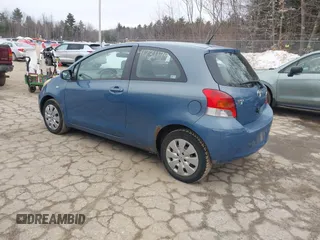2009 Toyota Yaris with VIN JTDJT903495259987, listed as a IAAI auction lot 41731179 with 159,097 mi miles. Bid and sale history available at carsss.com. Image 3.