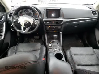 2016 Mazda CX-5 Grand Touring with VIN JM3KE2DY4G0811386, listed as a Copart auction lot 51961795 with 99,525 mi miles and Salvage Title. Bid and sale history available at carsss.com. Image 8.