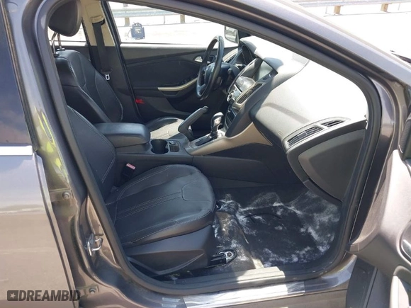 2012 Ford Focus SEL with VIN 1FAHP3H28CL282080, listed as a IAAI auction lot 42039926 with 134,785 mi miles. Bid and sale history available at carsss.com. Image 5.