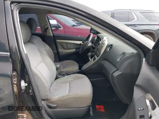 2009 Toyota Matrix with VIN 2T1KU40EX9C013986, listed as a IAAI auction lot 42117914 with 151,113 mi miles. Bid and sale history available at carsss.com. Image 5.