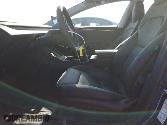 2025 Tesla Model 3 Long Range with VIN 5YJ3E1EA6SF935839, listed as a Copart auction lot 57665785 with 5,996 mi miles and Salvage title. Bid and sale history available at DreamBid. Image 7.