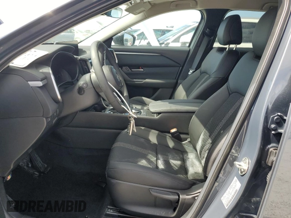 2025 Mazda CX-50 S Select with VIN 7MMVABAMXSN301011, listed as a Copart auction lot 77063504 with Not Provided miles and Salvage Title. Bid and sale history available at DreamBid. Image 7.