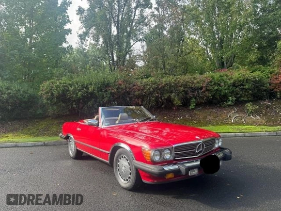 1987 Mercedes-Benz 560 SL z VIN WDBBA48D8HA065591, wystawiony jako Copart lot #73538474 z przebiegiem 119 516 mil mil oraz Czysty tytuł • Clean title. Historia ofert i sprzedaży dostępna na DreamBid. Obrazek 1.