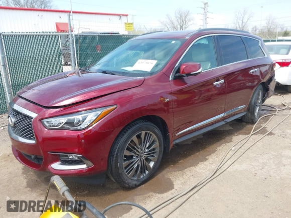 2019 Infiniti QX60 Luxe with VIN 5N1DL0MM5KC515014, listed as a IAAI auction lot 42073879 with 100,566 mi miles and . Bid and sale history available at DreamBid. Image 2.