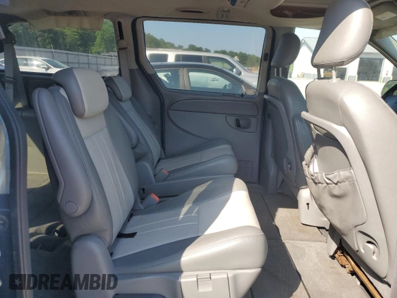 2006 Dodge Grand Caravan SXT z VIN 2D4GP44L06R699332, wystawiony jako Copart lot #58995465 z przebiegiem 55 324 mil mil oraz Szkoda całkowita • Salvage title. Historia ofert i sprzedaży dostępna na DreamBid. Obrazek 11.