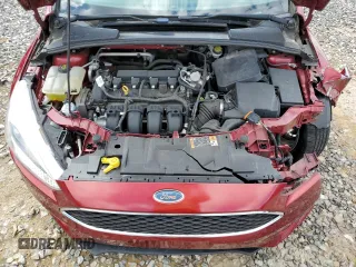 2016 Ford Focus SE z VIN 1FADP3F22GL355192, wystawiony jako Copart lot #56614225 z przebiegiem 56 214 mil mil oraz Szkoda całkowita • Salvage title. Historia ofert i sprzedaży dostępna na DreamBid. Obrazek 11.