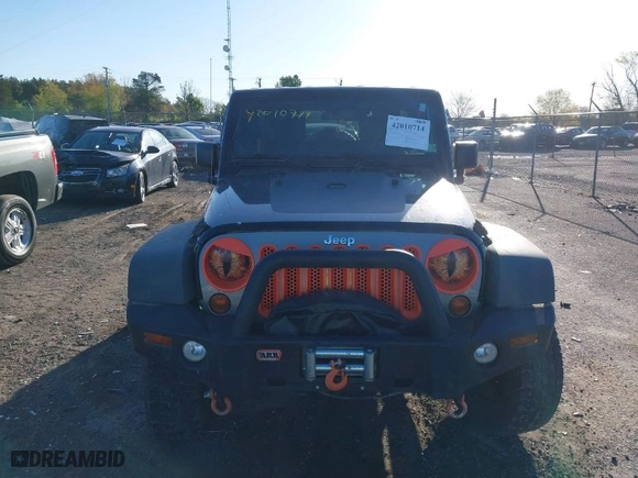 2010 Jeep Wrangler Unlimited Sport with VIN 1J4BA3H17AL219679, listed as a IAAI auction lot 42010714 with 194,172 mi miles. Bid and sale history available at carsss.com. Image 12.
