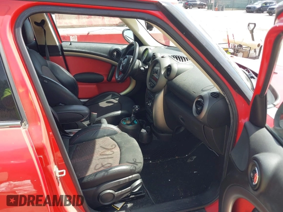 2012 MINI Countryman z VIN WMWZB3C50CWM03467, wystawiony jako IAAI lot #42318106 z przebiegiem 163 289 mil mil oraz . Historia ofert i sprzedaży dostępna na DreamBid. Obrazek 5.