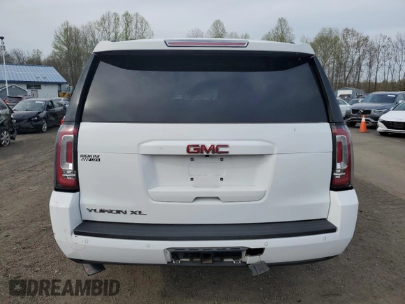 2018 GMC Yukon XL SLT with VIN 1GKS2GKC8JR307890, listed as a Copart auction lot 54428945 with 65,590 mi miles and Salvage title. Bid and sale history available at DreamBid. Image 6.