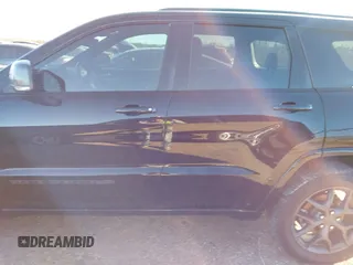 2021 Jeep Grand Cherokee 80th Anniversary with VIN 1C4RJFBG9MC527654, listed as a IAAI auction lot 41212055 with 92,436 mi miles and . Bid and sale history available at DreamBid. Image 14.