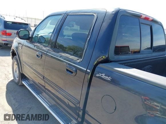 2001 Ford F-150 XLT with VIN 1FTRW08L71KA41543, listed as a IAAI auction lot 42205400 with 69,454 mi miles and . Bid and sale history available at DreamBid. Image 13.