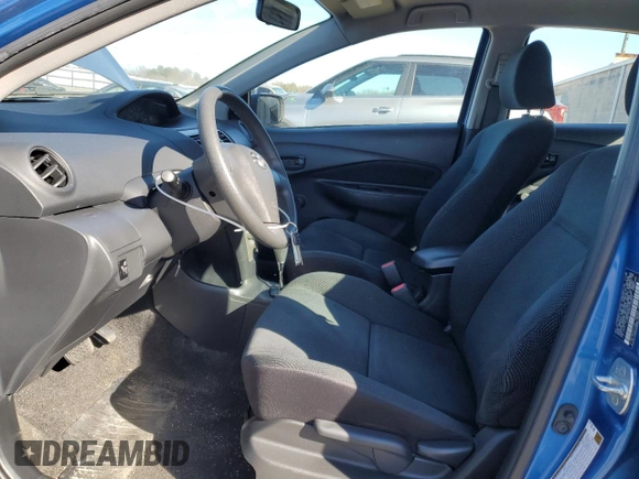 2009 Toyota Yaris with VIN JTDBT903891323833, listed as a Copart auction lot 47460975 with 134,524 mi miles and Salvage Title. Bid and sale history available at DreamBid. Image 7.
