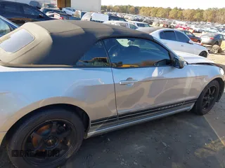 2013 Ford Mustang V6 with VIN 1ZVBP8EM0D5204477, listed as a IAAI auction lot 41009715 with 190,564 mi miles and . Bid and sale history available at DreamBid. Image 13.