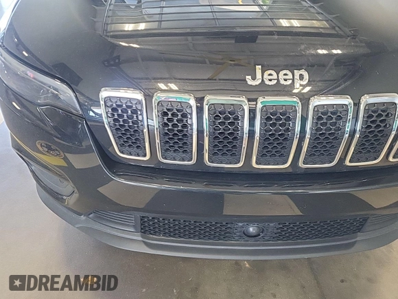 2021 Jeep Cherokee Latitude Plus z VIN 1C4PJLLB5MD223983, wystawiony jako IAAI lot #42741294 z przebiegiem 49 704 mil mil oraz . Historia ofert i sprzedaży dostępna na DreamBid. Obrazek 18.