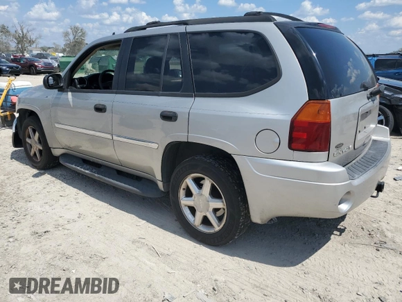 2007 GMC Envoy SLT with VIN 1GKDS13SX72163482, listed as a Copart auction lot 72439864 with 218,719 mi miles and Salvage Title. Bid and sale history available at carsss.com. Image 2.