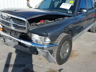 2001 Dodge Dakota Sport with VIN 1B7HL2AN21S319390, listed as a IAAI auction lot 40836729 with 118,823 mi miles. Bid and sale history available at carsss.com. Image 6.