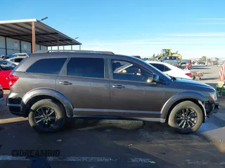 2019 Dodge Journey SE with VIN 3C4PDCBG7KT872888, listed as a IAAI auction lot 41390094 with 114,513 mi miles and . Bid and sale history available at DreamBid. Image 14.