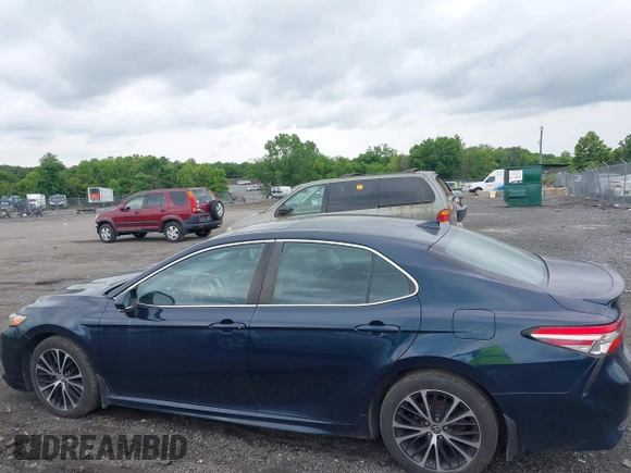2019 Toyota Camry LE z VIN 4T1B11HK2KU738133, wystawiony jako IAAI lot #42499213 z przebiegiem 203 636 mil mil oraz . Historia ofert i sprzedaży dostępna na DreamBid. Obrazek 14.
