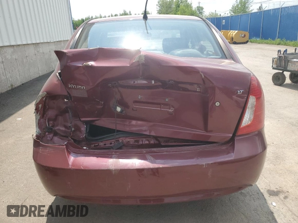 2006 Hyundai Accent GL z VIN KMHCN45C26U052459, wystawiony jako Copart lot #60089355 z przebiegiem 247 311 mil mil oraz Szkoda całkowita • Salvage title. Historia ofert i sprzedaży dostępna na DreamBid. Obrazek 6.
