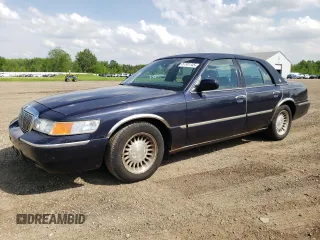 2001 Mercury Grand Marquis LS z VIN 2MEFM75W71X611102, wystawiony jako Copart lot #57301745 z przebiegiem 70 404 mil mil oraz Czysty tytuł • Clean title. Historia ofert i sprzedaży dostępna na DreamBid. Obrazek 1.