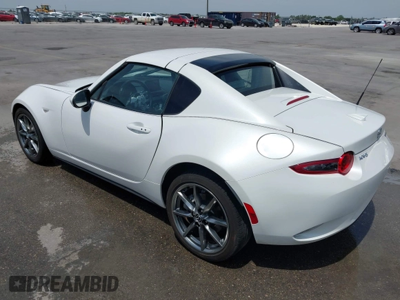 2023 Mazda MX-5 Miata Grand Touring с VIN JM1NDAM71P0560062, выставлен на аукционе IAAI как лот 42065123 с пробегом 11 320 миль миль и . История ставок и продаж доступна на DreamBid. Изображение 3.