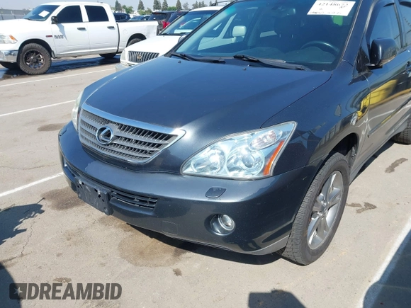 2006 Lexus RX 400h with VIN JTJHW31U560009707, listed as a IAAI auction lot 42148672 with 198,569 mi miles and . Bid and sale history available at DreamBid. Image 6.