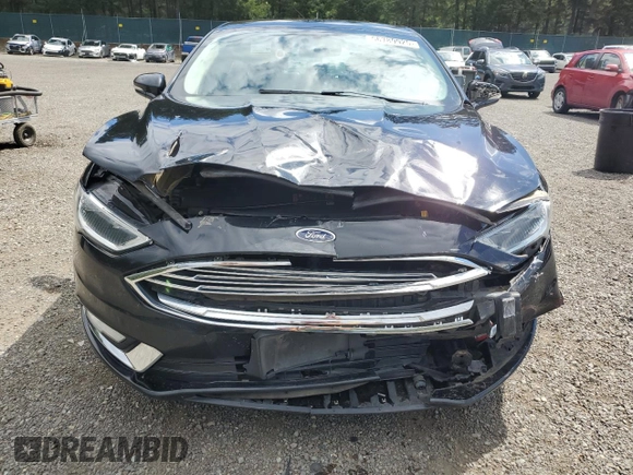 2017 Ford Fusion SE z VIN 3FA6P0H96HR150012, wystawiony jako Copart lot #56789925 z przebiegiem 167 772 mil mil oraz Szkoda całkowita • Salvage title. Historia ofert i sprzedaży dostępna na DreamBid. Obrazek 5.
