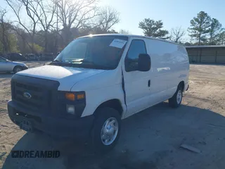2011 Ford Econoline Cargo Commercial with VIN 1FTNE1EW2BDA61677, listed as a IAAI auction lot 41854181 with 195,582 mi miles and . Bid and sale history available at carsss.com. Image 2.