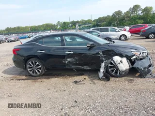 2016 Nissan Maxima Platinum z VIN 1N4AA6AP8GC901079, wystawiony jako IAAI lot #42423396 z przebiegiem 100 750 mil mil oraz . Historia ofert i sprzedaży dostępna na DreamBid. Obrazek 13.