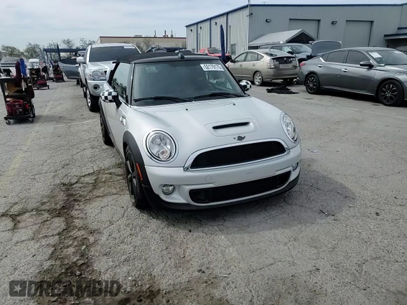 2014 MINI Convertible S with VIN WMWZP3C53ET707205, listed as a Copart auction lot 52179175 with 101,209 mi miles and Salvage Title. Bid and sale history available at DreamBid. Image 13.