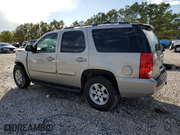 2009 GMC Yukon SLT w/4SA with VIN 1GKFC33J99R148006, listed as a Copart auction lot 88668535 with 145,088 mi miles and Salvage Title. Bid and sale history available at carsss.com. Image 2.